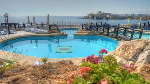 Indoor pool, 2 outdoor pools, pool umbrellas, pool loungers
