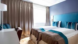 Desk, laptop workspace, blackout curtains, cots/infant beds