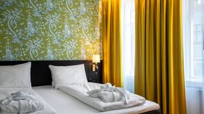 Hypo-allergenic bedding, pillow top beds, minibar, in-room safe