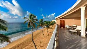 On the beach, white sand, free beach cabanas, sun-loungers