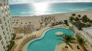 beach royal sunset resort cancun inclusive umbrellas towels sand 2022