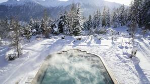 Indoor pool, outdoor pool, pool umbrellas, pool loungers