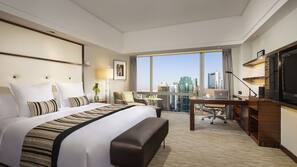 Luxe beddengoed, een minibar, een kluis op de kamer