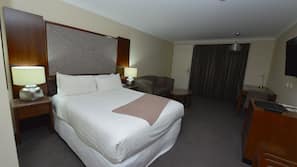 Minibar, desk, laptop workspace, iron/ironing board