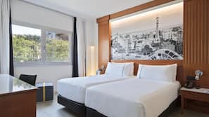 Premium bedding, down comforters, minibar, in-room safe