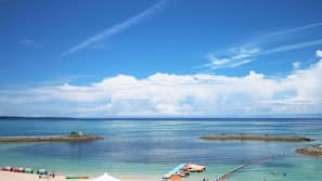 Private beach, white sand, beach cabanas, beach umbrellas