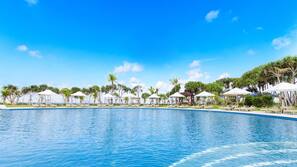 Indoor pool, seasonal outdoor pool, free pool cabanas, pool umbrellas