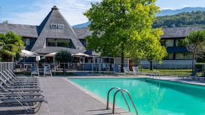 Seasonal outdoor pool, open 9:30 AM to 7:00 PM, sun loungers