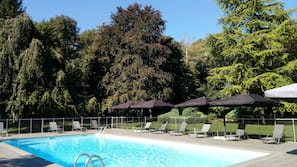 Seasonal outdoor pool, open 9:30 AM to 7:00 PM, sun loungers