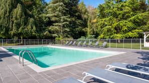 Seasonal outdoor pool, open 9:30 AM to 7:00 PM, sun loungers