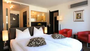 Premium bedding, down comforters, minibar, in-room safe