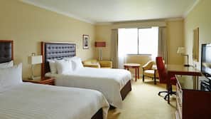 Down comforters, pillowtop beds, in-room safe, desk