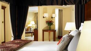 Down comforters, pillowtop beds, in-room safe, desk