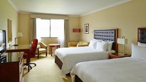 Down comforters, pillowtop beds, in-room safe, desk