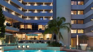 Outdoor pool, pool umbrellas, sun loungers