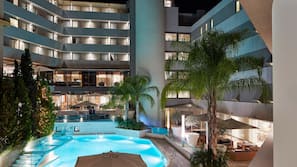 Outdoor pool, pool umbrellas, sun loungers