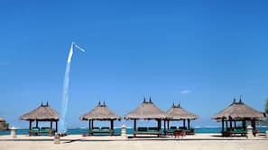 Private beach, white sand, free beach cabanas, sun-loungers