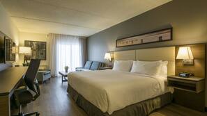 Hypo-allergenic bedding, desk, laptop workspace, blackout curtains