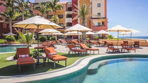 5 piscinas externas, guarda-sóis