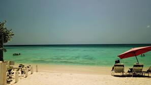 Beach nearby, white sand, sun-loungers, beach umbrellas