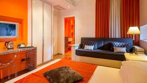 Luxe beddengoed, een minibar, een kluis op de kamer, extra bedden