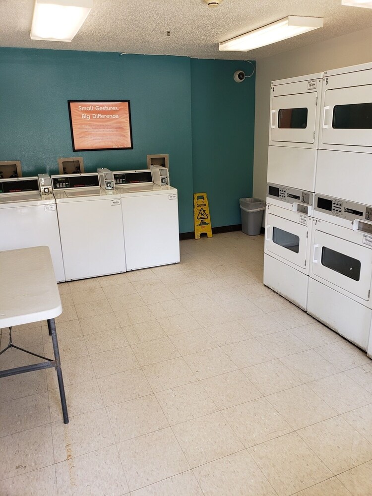 Laundry room, InTown Suites Extended Stay Hattiesburg