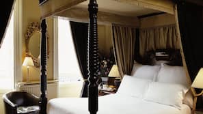 Roupas de cama premium, frigobar, cofres nos quartos