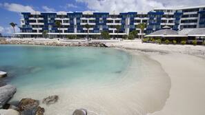 On the beach, sun loungers, beach umbrellas, beach towels