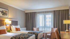Hypo-allergenic bedding, in-room safe, desk, laptop workspace