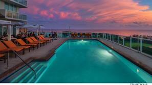 Outdoor pool, open 9:00 AM to 7:00 PM, free pool cabanas, pool umbrellas