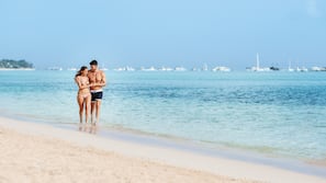 On the beach, sun-loungers, beach towels, beach massages