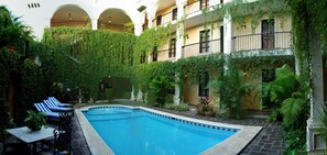 Outdoor pool, open 8 AM to 8 PM, sun loungers