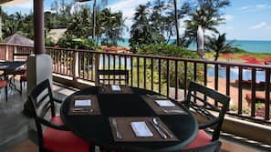 On the beach, sun-loungers, beach umbrellas, beach towels