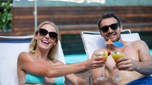 Indoor pool, pool umbrellas, pool loungers