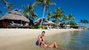 Private beach, white sand, sun loungers, beach towels