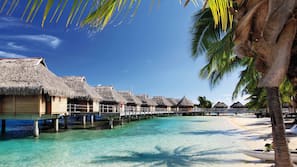 Private beach, white sand, sun loungers, beach towels