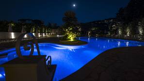 Seasonal outdoor pool, pool umbrellas, sun loungers