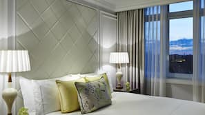 Premium bedding, down comforters, minibar, in-room safe