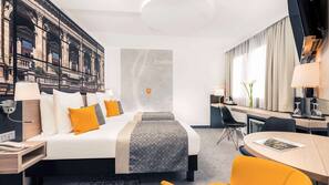 Ropa de cama hipoalergénica, minibar, caja fuerte y escritorio