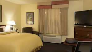 Hypo-allergenic bedding, desk, laptop workspace, blackout curtains