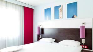 Premium bedding, iron/ironing board, free WiFi, alarm clocks