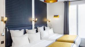 Luxe beddengoed, een kluis op de kamer, een bureau