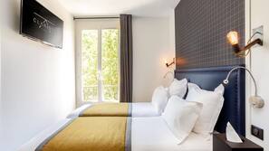 Luxe beddengoed, een kluis op de kamer, een bureau