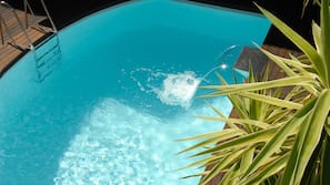 Seasonal outdoor pool, pool umbrellas, pool loungers