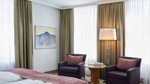 Hypo-allergenic bedding, down comforters, free minibar, in-room safe
