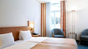Hypo-allergenic bedding, down comforters, free minibar, in-room safe