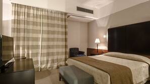Copriletto in piuma, materassi a doppio strato, minibar