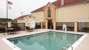 Seasonal outdoor pool, open 9 AM to 9 PM, pool umbrellas, sun loungers