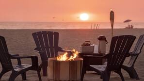 On the beach, sun loungers, beach umbrellas, beach towels