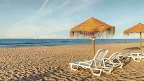 On the beach, white sand